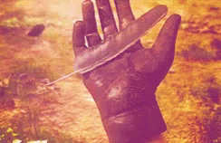Hand Holding Feather GIF