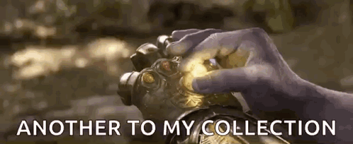 Hand Holding Glove Another To My Collection GIF