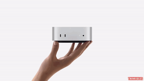 Hand Holding Small Apple Intelligence Box