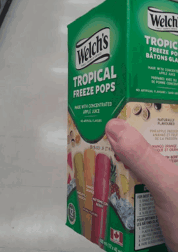 Hand Holding Welch's Tropical Freeze Pops GIF