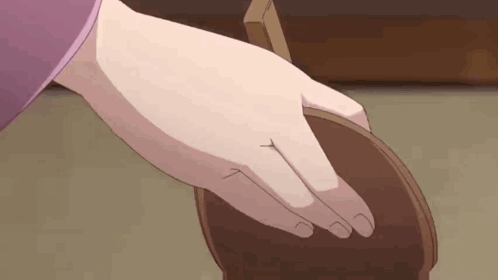 Hand Holding Wood