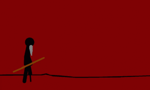 Hand Placing Raspberry on Cupcake, Red Background