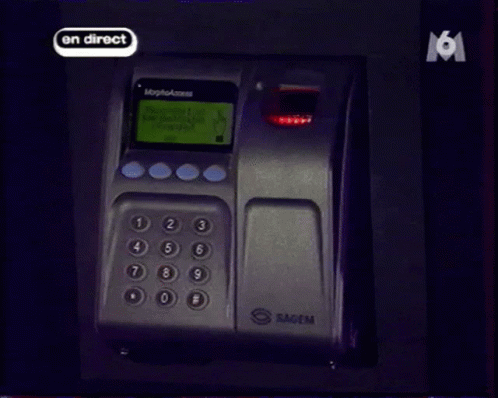 Hand Pressing Button Saying En Direct