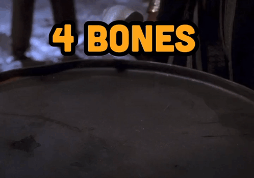 Hand Reaching for Pile of 4 Bones