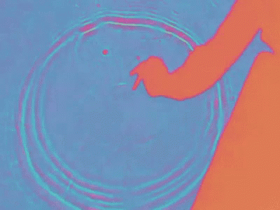Hand Reaching Into Water GIF
