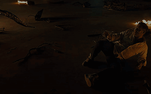 Hand Reaching Out In Front Of Building With Letter A GIF