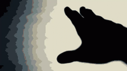 Hand Silhouette Reaching Out in Front of Rainbow