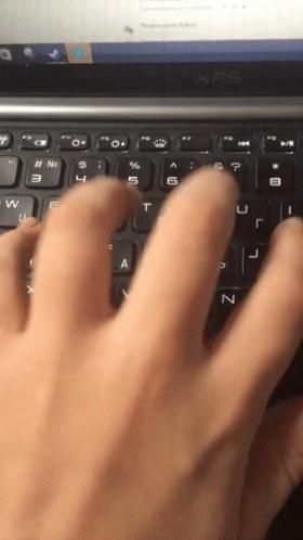 Hand Typing On XPS Laptop