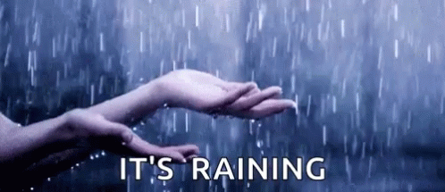 Hands Catching Raindrop
