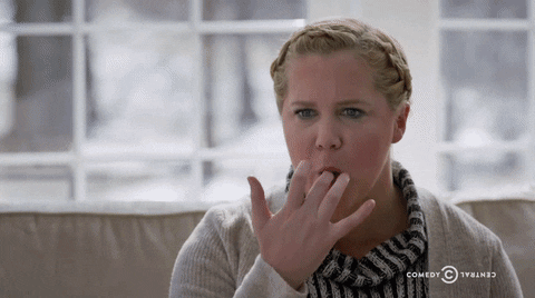 Hangry Amy Schumer Licking Fingers GIF