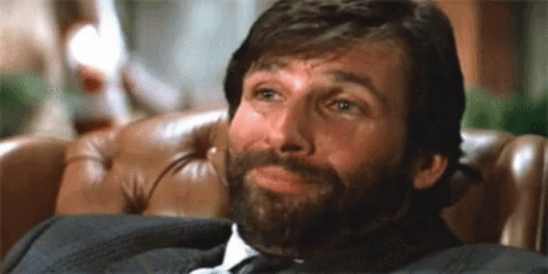 Hans On Couch Die Hard GIF