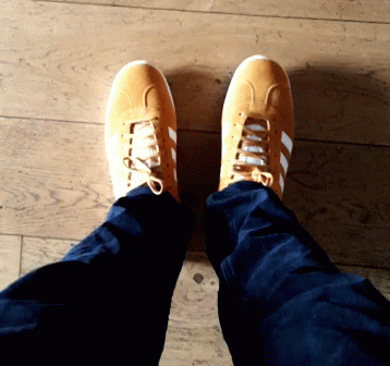 Happily Wearing Yellow Adidas Shoes GIF