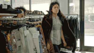 Happy Black Friday Women Walking With Shopping Bags GIF
