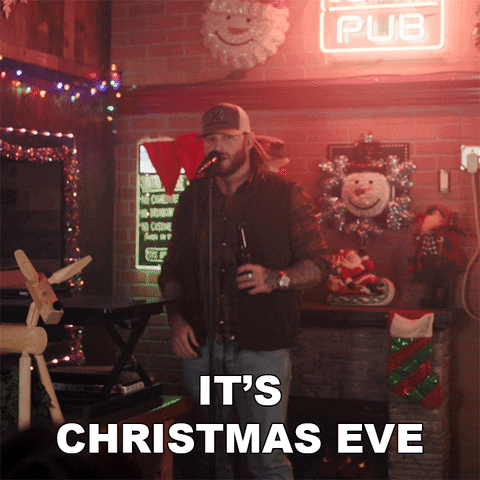 Happy Christmas Eve Jon Langston Singing GIF