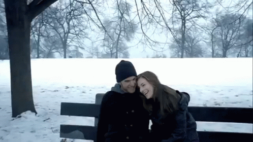 Happy Couple On Snowfall GIF