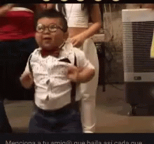 Cute Kid Wearing Eyeglasses Happy Dancing GIF