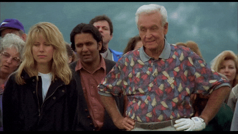 Happy Gilmore Bob Barker Both Hands On Waist GIF
