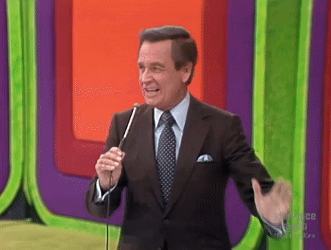 Happy Gilmore Bob Barker Holding Mic With Hand Gesture GIF