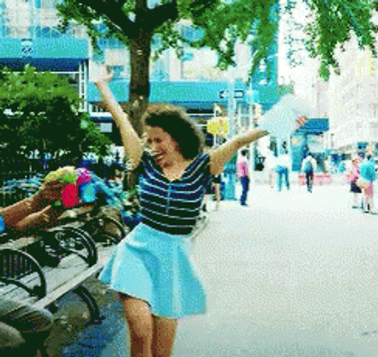Happy Girl Skipping GIF