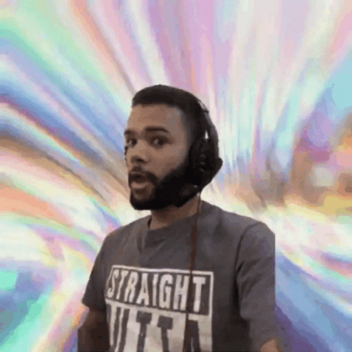 Happy Guy Showing Off Credit Card GIF