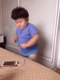 Happy Kid Charge His Phone GIF