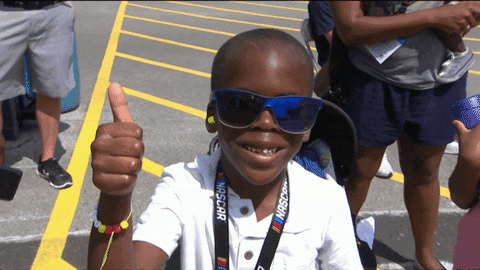 Happy Kid Thumbs Up On The Streets GIF