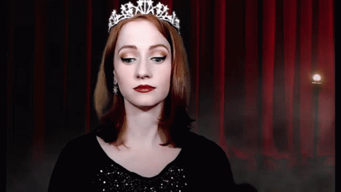 Happy Lady Clutching Pearls GIF