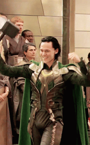 Happy Loki Holding Thor's Hammer GIF
