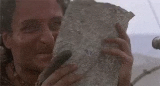 Happy Man Holding Paper GIF