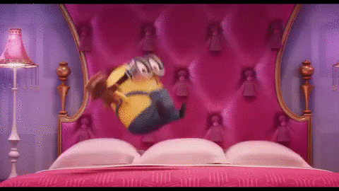 Happy Minion Pink Bed GIF