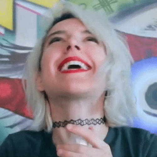 Happy Woman Saying Heaven GIF