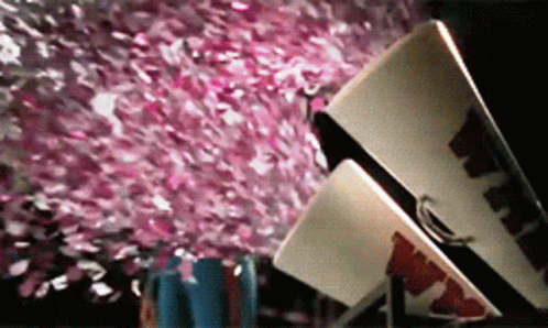 Happy Woman With Confetti GIF