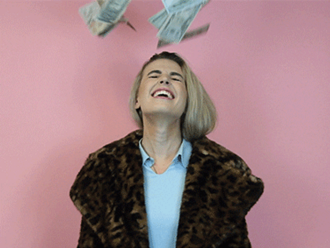 Happy Woman With Falling Money GIF