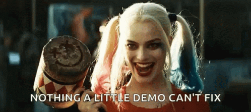 Harley Quinn Holding Smiley Mallet GIF