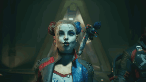 Harley Quinn Is Wearing A Red And Blue Jacket GIF