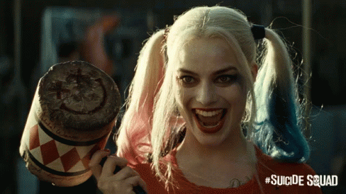 Harley Quinn Smiling Holding Mallet