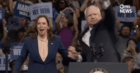 Harris Walz Laughing Raise Holding Hand GIF