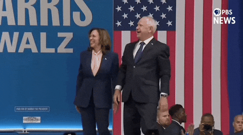Harris Walz Raise Hands Waives GIF