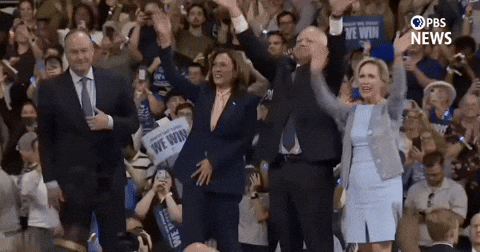 Harris Walz With Team Waiving Hands GIF