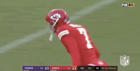 Harrison Butker Both Hands Up Running Fast GIF