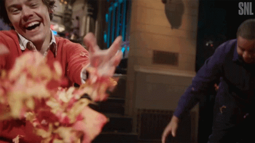 Harry Playfully Scatter Falling Leaves GIF