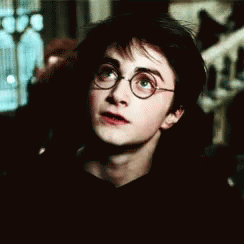 Harry Potter in Glasses and Black Shirt Making Funny Face