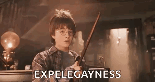 Harry Potter Is Holding A Wand In A Dark Room And Saying Expelegayness . GIF