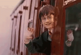 Harry Potter Is Looking Out Of A Train Window And Waving . GIF