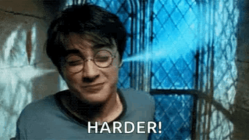 Harry Potter Is Smiling In Front Of A Window And Says Harder . GIF