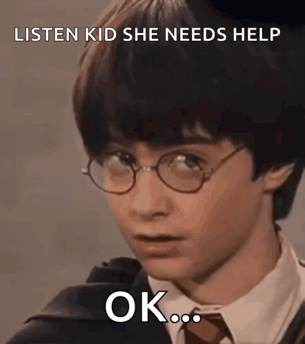 Harry Potter Is Wearing Glasses And A Suit And Tie And Making A Funny Face . GIF