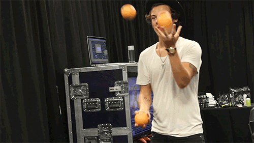 Harry Style Juggling Oranges GIF