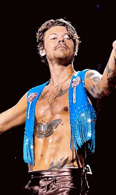 Harry Styles Blue Vest With Fringe and Chest Tattoo