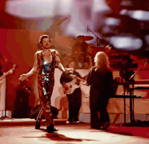 Harry Styles In Glamour Coachella Outfit GIF