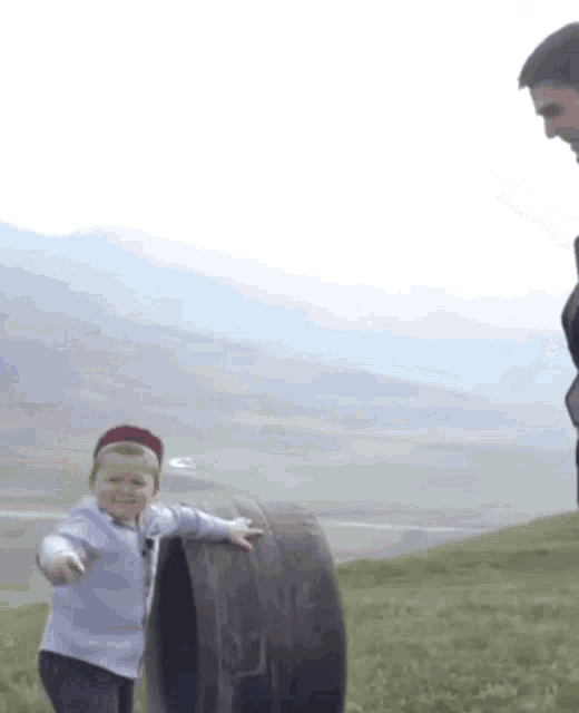 Hasbulla Camera Prank Push Rolling Car Wheel GIF